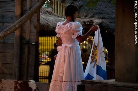 Young woman with the uruguayan flag - Tacuarembo - URUGUAY. Photo #39704
