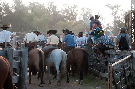 Paisanos on horseback outside the arena - Tacuarembo - URUGUAY. Photo #39498