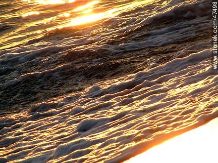 Breaking waves on the shore at sunset - Department of Maldonado - URUGUAY. Photo #47498