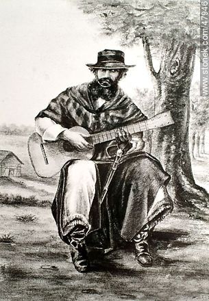 Gaucho playing guitar, 1889. -  - URUGUAY. Photo #47946