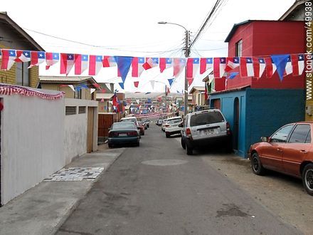 Population of Arica adorned with Chilean flags. - Chile - Others in SOUTH AMERICA. Photo #49938