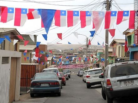 Population of Arica adorned with Chilean flags. - Chile - Others in SOUTH AMERICA. Photo #49937