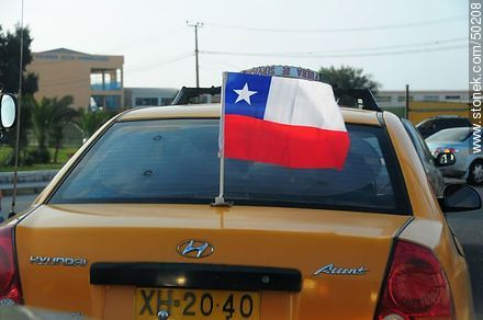 Yellow Taxi with a Chilean flag - Chile - Others in SOUTH AMERICA. Photo #50208