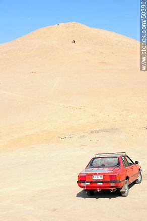 Car at the foot of a hill. - Chile - Others in SOUTH AMERICA. Photo #50390