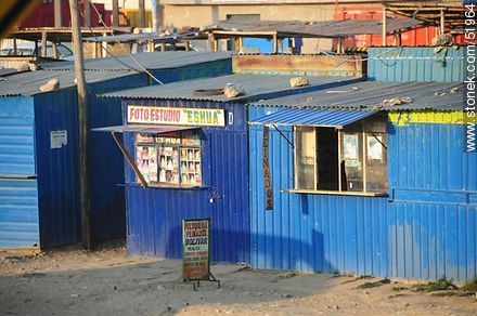 El Alto. Shops painted in blue. - Bolivia - Others in SOUTH AMERICA. Photo #51964