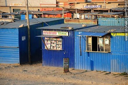 El Alto. Shops painted in blue. - Bolivia - Others in SOUTH AMERICA. Photo #51962