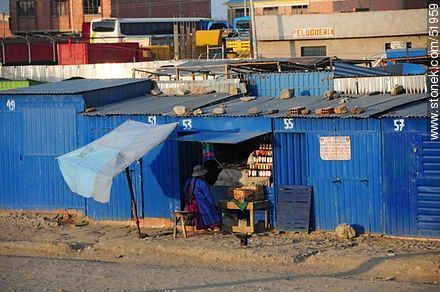El Alto. Shops painted in blue. - Bolivia - Others in SOUTH AMERICA. Photo #51959