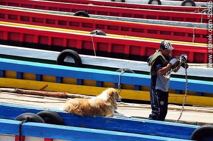 Tiquina. Flat-bottomed  boats for the vehicle crossing to the other side - Bolivia - Others in SOUTH AMERICA. Photo #52635