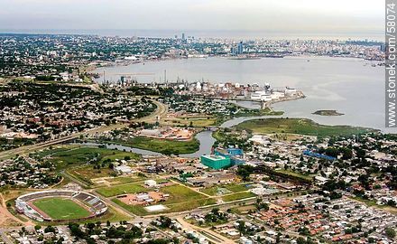 Aerial view of Cerro stadium, Pantanoso creek and the PTI Industrial Technology Park - Department of Montevideo - URUGUAY. Photo #58074