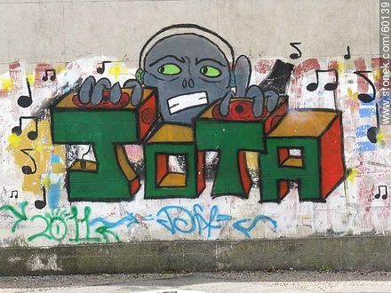 Graffiti on wall of a cemetery in Buceo - Department of Montevideo - URUGUAY. Photo #60139