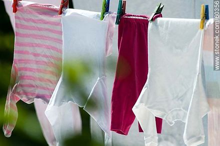 Clothes on a rope hanging from sticks -  - MORE IMAGES. Photo #60356