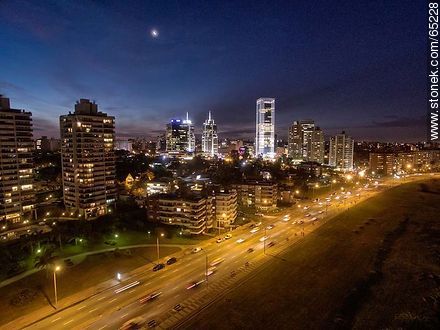 Nocturnal aerial photo of the Rambla Armenia, buildings and towers - Department of Montevideo - URUGUAY. Photo #65228