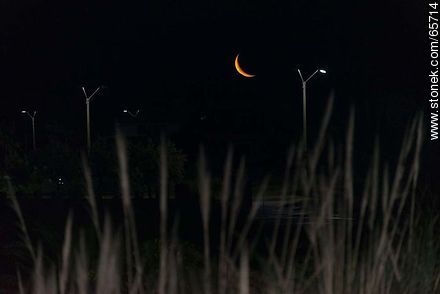 Moon in growing quarter poking at night - Department of Maldonado - URUGUAY. Photo #65714