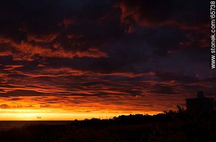 Reddish clouds at sunset - Department of Maldonado - URUGUAY. Photo #65738