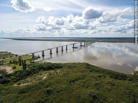 Aerial view of the Gral. San Martín bridge linking Fray Bentos (UY) and Puerto Unzué (AR) - Rio Negro - URUGUAY. Photo #66056