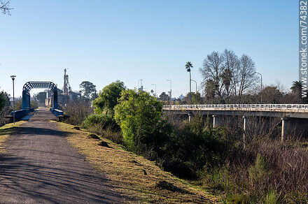 Asphalt road over the old railway line - Department of Cerro Largo - URUGUAY. Photo #74382