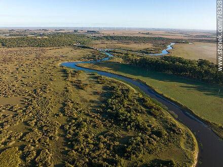 Vista aérea del arroyo San Miguel y campos cultivados - Departamento de Rocha - URUGUAY. Foto No. 78328