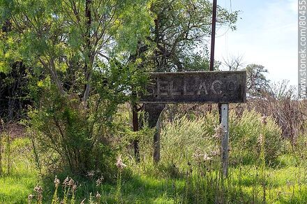 Old Bellaco train station. Station sign among the trees - Rio Negro - URUGUAY. Photo #80455