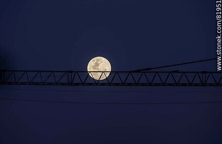 Full moon behind the crane boom -  - MORE IMAGES. Photo #81951