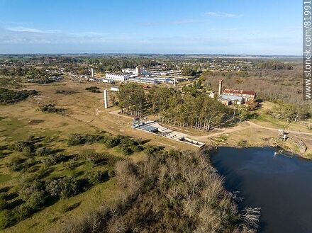 Aerial view of the Santa Lucia river in front of the OSE plant. - Department of Canelones - URUGUAY. Photo #81991