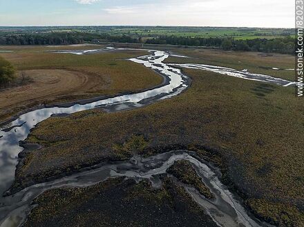 Aerial view of the lack of water and drought of the year 2023 in the Canelón Grande stream reservoir - Department of Canelones - URUGUAY. Photo #82023
