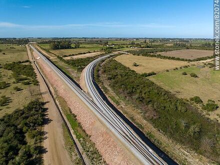 Aerial view of the railroad tracks to the cities of Canelones and Santa Lucía - Department of Canelones - URUGUAY. Photo #82074
