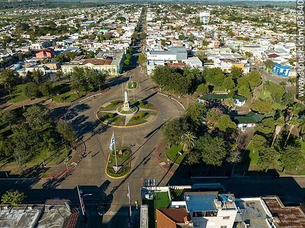 Aerial view of Lecueder Avenue, obelisk and Batlle y Ordóñez square. - Artigas - URUGUAY. Photo #83640