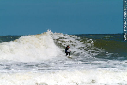 Surfer in Playa Brava - Punta del Este and its near resorts - URUGUAY. Photo #10857
