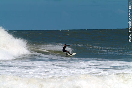 Surfer in Playa Brava - Punta del Este and its near resorts - URUGUAY. Photo #10858