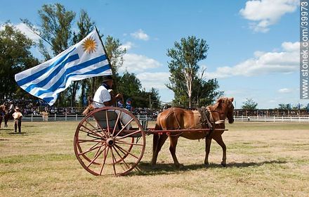 Contest of peasant boys and girls. Winners parade. Uruguayan flag. - Tacuarembo - URUGUAY. Photo #39973