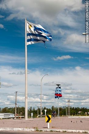 Uruguayan Flag and icon of Bicentennial of the Revolution in year of 1811  - Durazno - URUGUAY. Foto No. 40490
