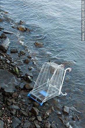 Supermarket trolley at the edge -  - MORE IMAGES. Photo #41074