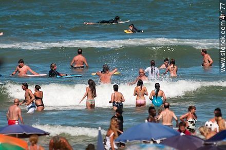 People in beach water - Punta del Este and its near resorts - URUGUAY. Photo #41177