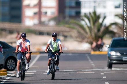 Women police bicycling - Punta del Este and its near resorts - URUGUAY. Photo #41141