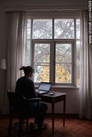 Writer in front of a window -  - MORE IMAGES. Photo #44549