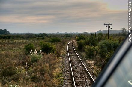View of countryside from the locomotive - Department of Montevideo - URUGUAY. Foto No. 45126