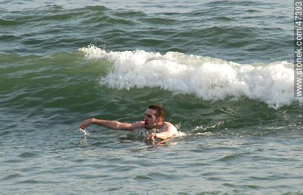 Young man on the sea - Department of Maldonado - URUGUAY. Photo #47393