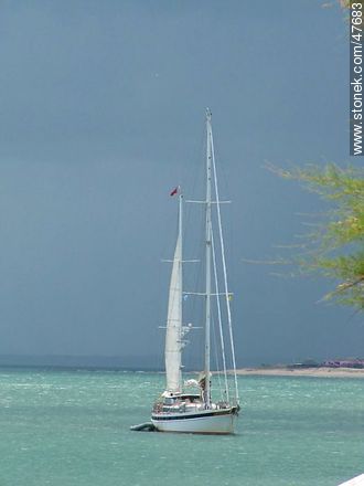 Sailboat in the turquoise sea - Department of Maldonado - URUGUAY. Photo #47683