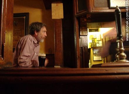 Regular customer and his beer - Ireland - BRITISH ISLANDS. Photo #48735
