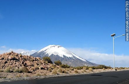 Volcano Parinacota from Route 11. Column by solar cells  lighting. - Chile - Others in SOUTH AMERICA. Photo #51783
