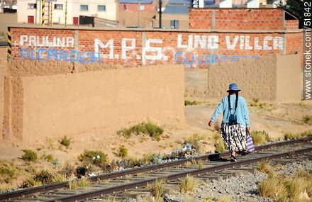 Bolivian Peasant walking along railroad tracks - Bolivia - Others in SOUTH AMERICA. Foto No. 51842