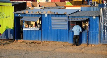 El Alto. Shops painted in blue. - Bolivia - Others in SOUTH AMERICA. Photo #51957