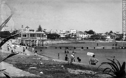 Swimmers and fishermen pier in the bay of Punta del Este. Old Photo. -  - MORE IMAGES. Photo #52983