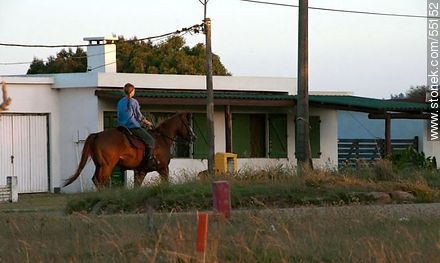 Horsewoman at dawn in Punta Colorada - Department of Maldonado - URUGUAY. Photo #55152