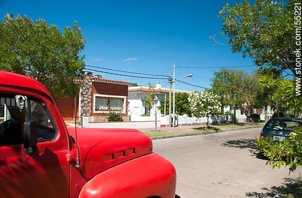 Red truck on the street Hector Barrios - Department of Maldonado - URUGUAY. Photo #55221
