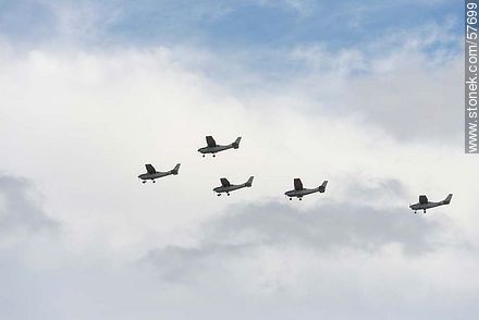 Formation of Cessna C-206 aircrafts - Department of Montevideo - URUGUAY. Photo #57699