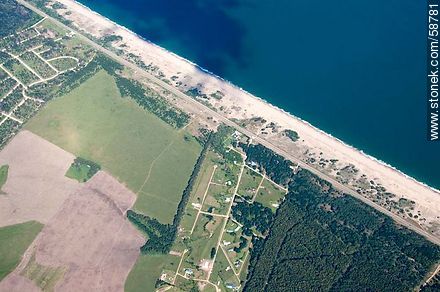 Aerial view of Route 10 bordering the Atlantic Ocean near the resort José Ignacio - Punta del Este and its near resorts - URUGUAY. Photo #58781