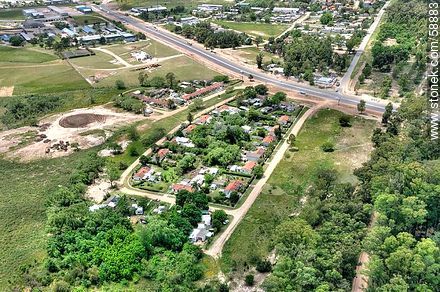 Vista aérea de un barrio residencial sobre la ruta 106 - Departamento de Canelones - URUGUAY. Foto No. 58883