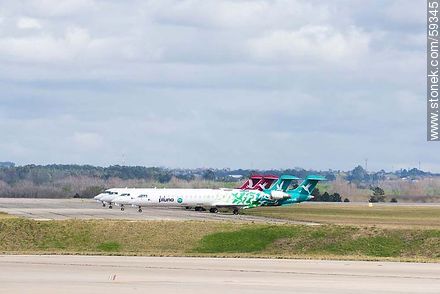 Pluna Bombardier airplanes (sept 2013) - Department of Canelones - URUGUAY. Foto No. 59345