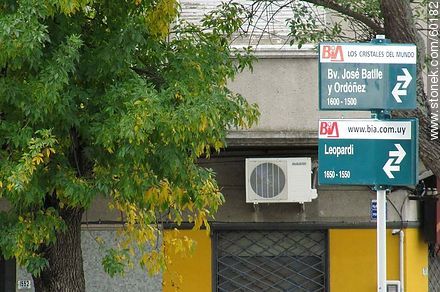 Signage with street names and block numbering - Department of Montevideo - URUGUAY. Photo #60182